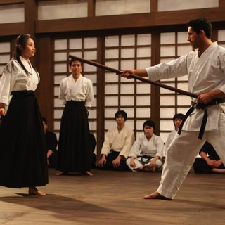 Mika Hijii stars as Namiko and Scott Adkins stars as Casey in Millennium Films' Ninja: Shadow of a Tear (2013)