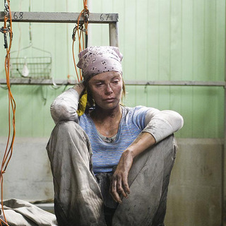 Charlize Theron as Josey Aimes, a female miner.