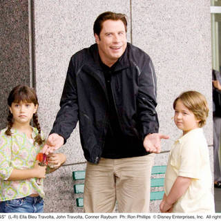 Ella Bleu Travolta, John Travolta and Conner Rayburn in Walt Disney Pictures' Old Dogs (2009). Photo credit by Ron Phillips.