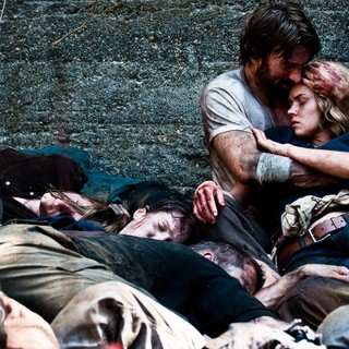 Sharlto Copley stars as John and Erin Richards stars as Sharon in Tribeca Film's Open Grave (2014)