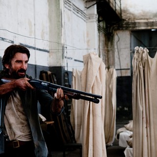 Sharlto Copley stars as John in Tribeca Film's Open Grave (2014)