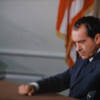 President Nixon in the Oval Office preparing for his historic phone call to Apollo 11 astronauts Neil Armstrong and Buzz Aldrin, who were at that very moment landing on the moon (July 20, 1969)