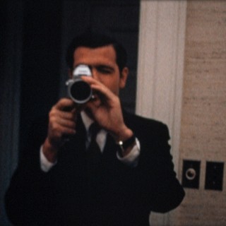 Special Assistant Dwight Chapin films Haldeman filming him at the White House on the night of the Apollo 11 moon landing (July 20, 1969)