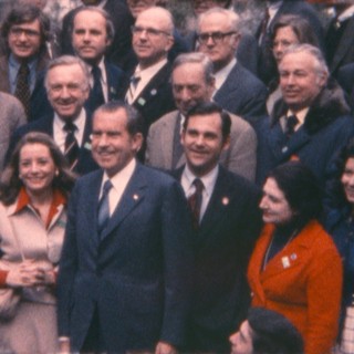 Nixon and the 87 members of the press who came with him to China pose for a photo