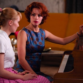 Deborah Francois stars as Rose Pamphyle and Berenice Bejo stars as Marie Taylor in The Weinstein Company's Populaire (2013)