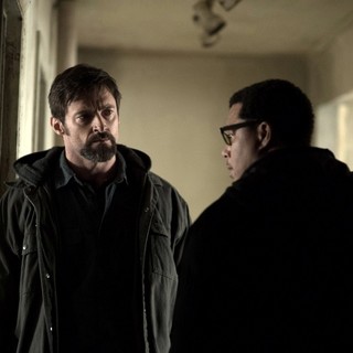 Hugh Jackman stars as Keller Dover and Terrence Howard stars as Franklin Birch in Warner Bros. Pictures' Prisoners (2013)