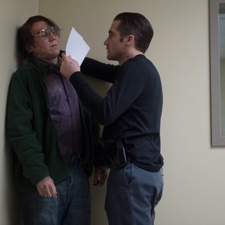 Paul Dano stars as Alex Jones and Jake Gyllenhaal stars as Detective Loki in Warner Bros. Pictures' Prisoners (2013)