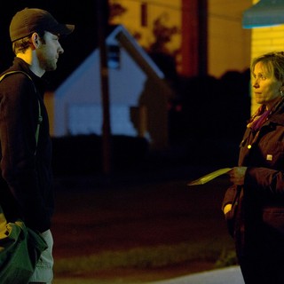 John Krasinski stars as Dustin Noble and Frances McDormand stars as Sue Thomason in Focus Features' Promised Land (2012)