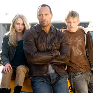AnnaSophia Robb, The Rock and Alexander Ludwig in Walt Disney Pictures' Race to Witch Mountain (2009)