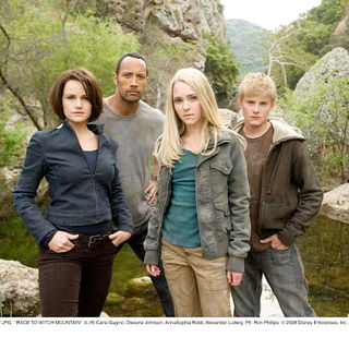 Carla Gugino, The Rock, AnnaSophia Robb and Alexander Ludwig in Walt Disney Pictures' Race to Witch Mountain (2009). Photo credit by Ron Phillips.