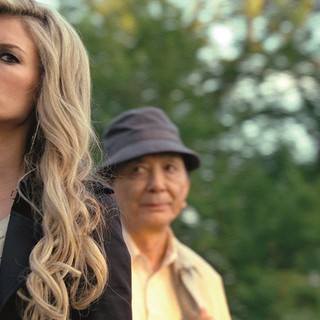 Kimberly Evan stars as 70s Secretary and James Hong stars as Nick's Avatar/Jerry Chen in Universal Pictures' R.I.P.D. (2013)