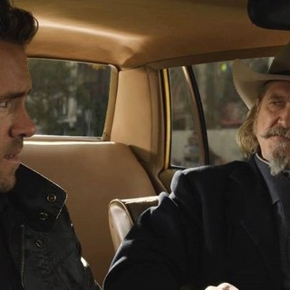 Ryan Reynolds stars as Nick Walker and Jeff Bridges stars as Roy Pulsipher in Universal Pictures' R.I.P.D. (2013)