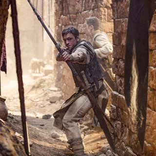 Eve Hewson stars as Maid Marian and Taron Egerton stars as Robin Hood in Lionsgate Films' Robin Hood (2018) Picture 2