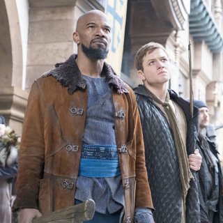 Eve Hewson stars as Maid Marian and Taron Egerton stars as Robin Hood in Lionsgate Films' Robin Hood (2018) Picture 3