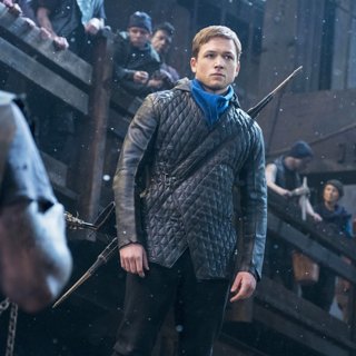 Eve Hewson stars as Maid Marian and Taron Egerton stars as Robin Hood in Lionsgate Films' Robin Hood (2018) Picture 5