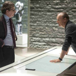 Gary Oldman stars as Dr. Dennett Norton and Michael Keaton stars as Raymond Sellars in Columbia Pictures' RoboCop (2014)