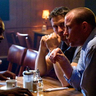 Idris Elba, Gerard Butler and Director Guy Ritchie in Warner Bros Pictures' RocknRolla (2008). Photo credit by Alex Bailey.