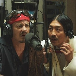 Jason London stars as Kurt Buzlerd and Brian Tee stars as Dwayne Archimedes in 310 House Media's Roswell FM (2014)