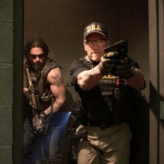 Joe Manganiello stars as Grinder and Arnold Schwarzenegger stars as John 'Breacher' Wharton in Open Road Films' Sabotage (2014)