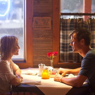 Julianne Hough stars as Katie Feldman and Josh Duhamel stars as Alex Wheatley in Relativity Media's Safe Haven (2013)
