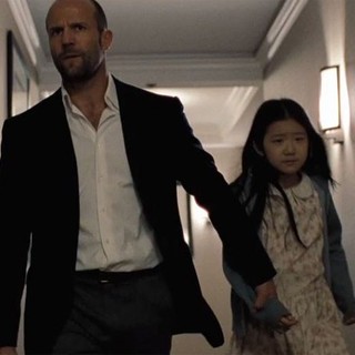 Jason Statham stars as Luke Wright and Catherine Chan stars as Mei in Lionsgate Films' Safe (2012)