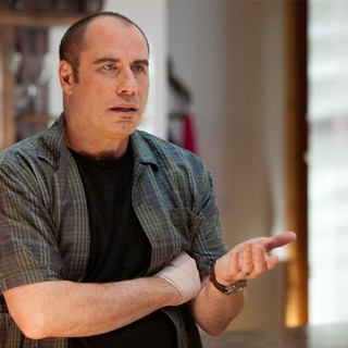 John Travolta stars as Dennis in Universal Pictures' Savages (2012)