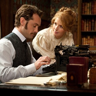 Jude Law stars as Dr. John Watson and Kelly Reilly stars as Mary Morstan in Warner Bros. Pictures' Sherlock Holmes: A Game of Shadows (2011)