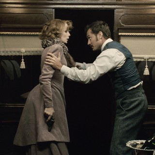 Kelly Reilly stars as Mary Morstan and Jude Law stars as Dr. John Watson in Warner Bros. Pictures' Sherlock Holmes: A Game of Shadows (2011)