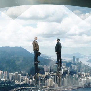 The Rock (Will Sawyer) and Chin Han in Universal Pictures' Skyscraper (2018)