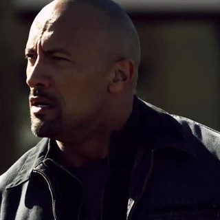 The Rock stars as John Matthews in Summit Entertainment's Snitch (2013)