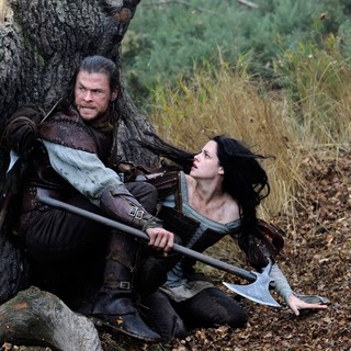 Chris Hemsworth stars as The Huntsman and Kristen Stewart stars as Snow White in Universal Pictures' Snow White and the Huntsman (2012)