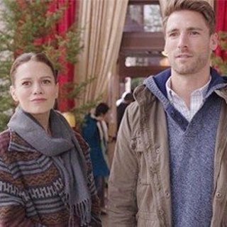 Bethany Joy Galeotti stars as Jenna Hudson and Andrew Walker stars as Kevin Jenner in Lifetime's Snowed-Inn Christmas (2017)