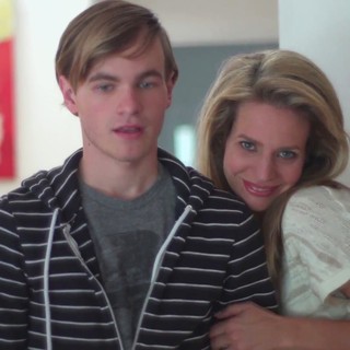 Graham Patrick Martin stars as Travis Tratten and Jessalyn Gilsig stars as Anna Thompson in Screen Media Films' Somewhere Slow (2014)