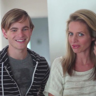 Graham Patrick Martin stars as Travis Tratten and Jessalyn Gilsig stars as Anna Thompson in Screen Media Films' Somewhere Slow (2014)