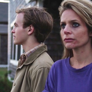 Graham Patrick Martin stars as Travis Tratten and Jessalyn Gilsig stars as Anna Thompson in Screen Media Films' Somewhere Slow (2014)