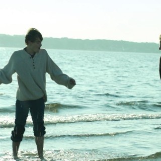 Graham Patrick Martin stars as Travis Tratten and Jessalyn Gilsig stars as Anna Thompson in Screen Media Films' Somewhere Slow (2014)