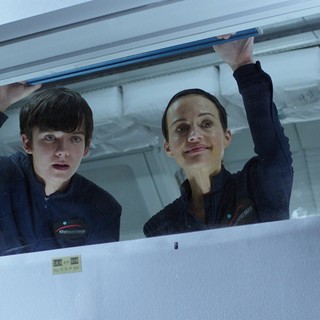 Asa Butterfield stars as Gardner Elliot and Carla Gugino stars as Kendra in STX Entertainment's The Space Between Us (2017)