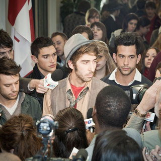 Patrick Martin stars as Etienne and David Giguere stars as Porte Parole in Entertainment One's Starbuck (2012)