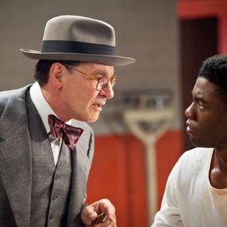 Harrison Ford stars as Branch Rickey and Chadwick Boseman stars as Jackie Robinson in Warner Bros. Pictures' 42 (2013)