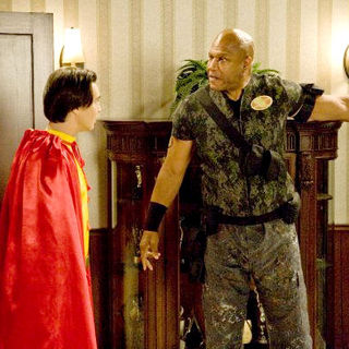 Justin Whalin stars as Ed Gruberman and Tommy 'Tiny' Lister stars as Sarge in Roadside Attractions' Super Capers (2009)