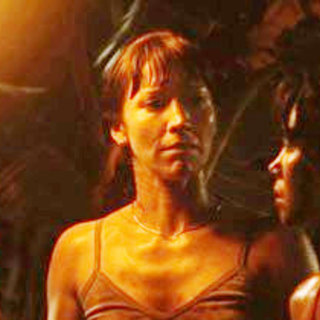 Louise Barnes stars as Rachel Rice and Natalie Jackson Mendoza stars as Cecilia 'Chill' Reyes in Focus Films' Surviving Evil (2009)