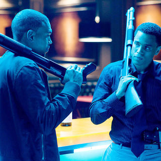 Chris Brown stars as Jesse Attica and Michael Ealy stars as Jake Attica in Screen Gems' Takers (2010)
