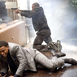 Michael Ealy stars as Jake Attica and Chris Brown stars as Jesse Attica in Screen Gems' Takers (2010)