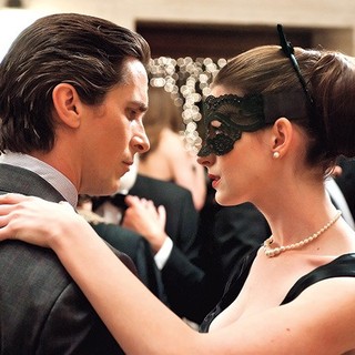 Christian Bale stars as Bruce Wayne/Batman and Anne Hathaway stars as Selina Kyle/Catwoman in Warner Bros. Pictures' The Dark Knight Rises (2012)