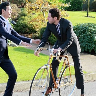 John Cho stars as Roger Whitacre and Paulo Costanzo stars as Adam Murphy in Joker Films' That Burning Feeling (2014)