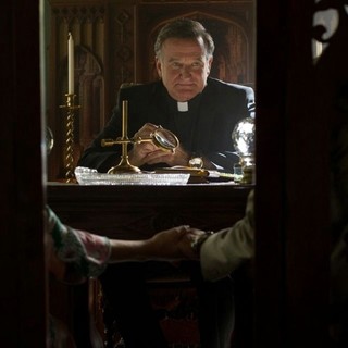 Robin Williams stars as Father Moinighan in Lionsgate Films' The Big Wedding (2013)