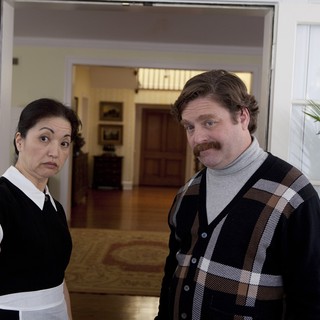 Karen Maruyama stars as Mrs. Yao and Zach Galifianakis stars as Marty Huggins in Warner Bros. Pictures' The Campaign (2012)