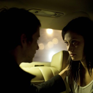 Simon Quarterman stars as Ben and Fernanda Andrade stars as Isabella Rossi in Paramount Pictures' The Devil Inside (2012)