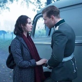 Lily James stars as Mieke de Jong and Jai Courtney stars as Capt. Stefan Brandt in A24's The Exception (2017)
