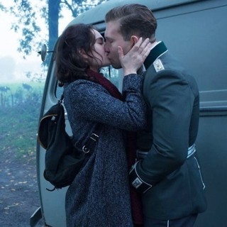 Lily James stars as Mieke de Jong and Jai Courtney stars as Capt. Stefan Brandt in A24's The Exception (2017)